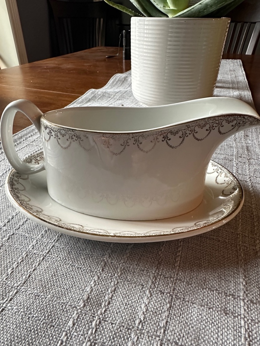 White Porcelain Gravy Boat with Gold Trim and Underplate